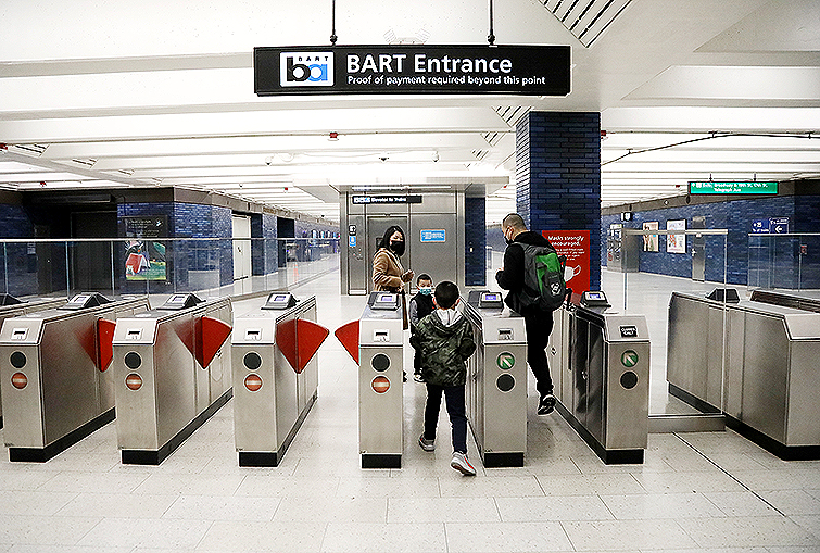 Riders enter the faregates at the modernized 19th Street Station 