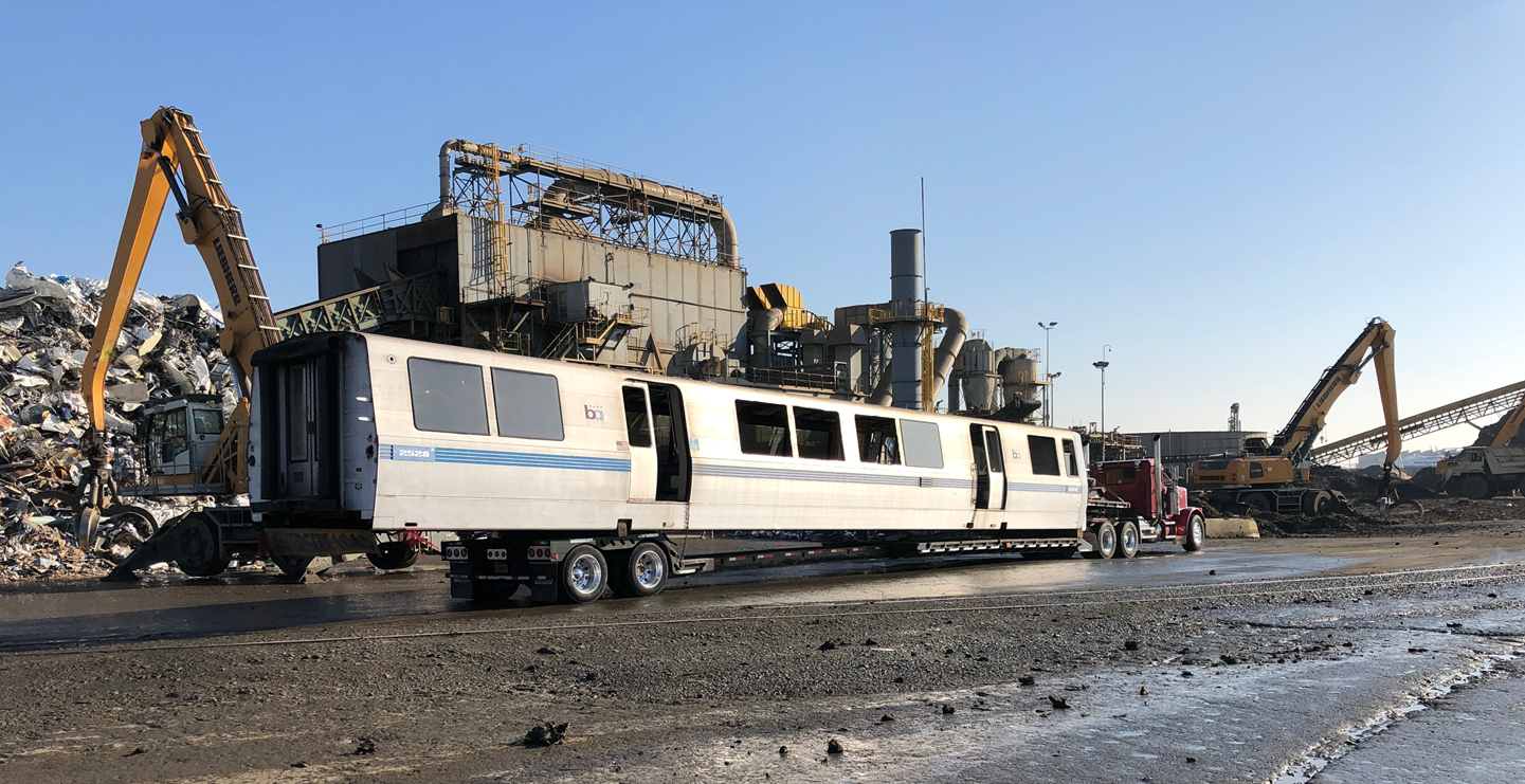 Car 2528 loaded onto a truck and ready to depart BART as the first decommissioned train car