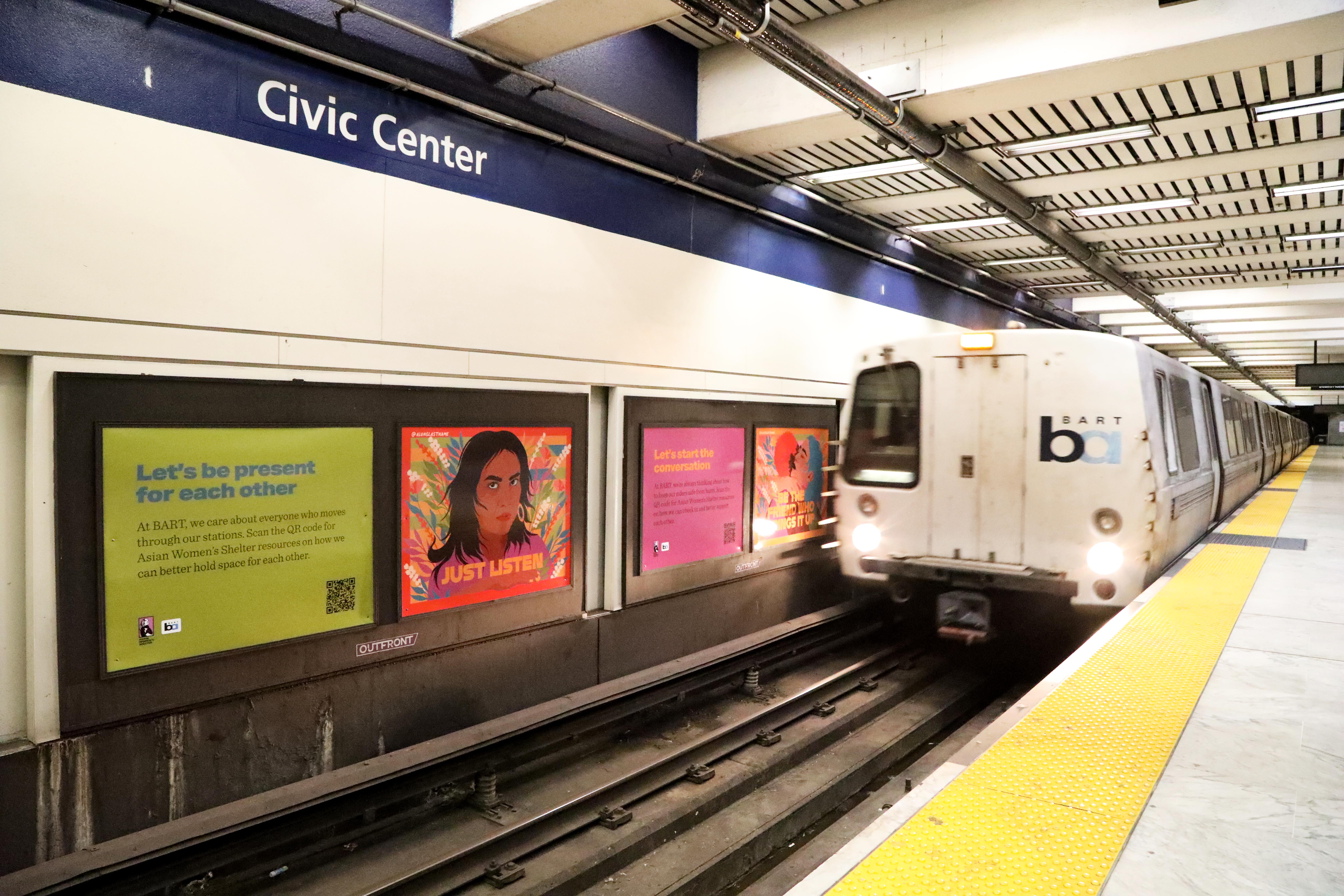 Let's Talk About Us posters at Civic Center Station platform