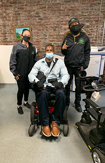 Stitt at his job interview with Urban Alchemy Elevator Attendant Program Director Tanya Bishop and Deputy Director Vincent Cofie