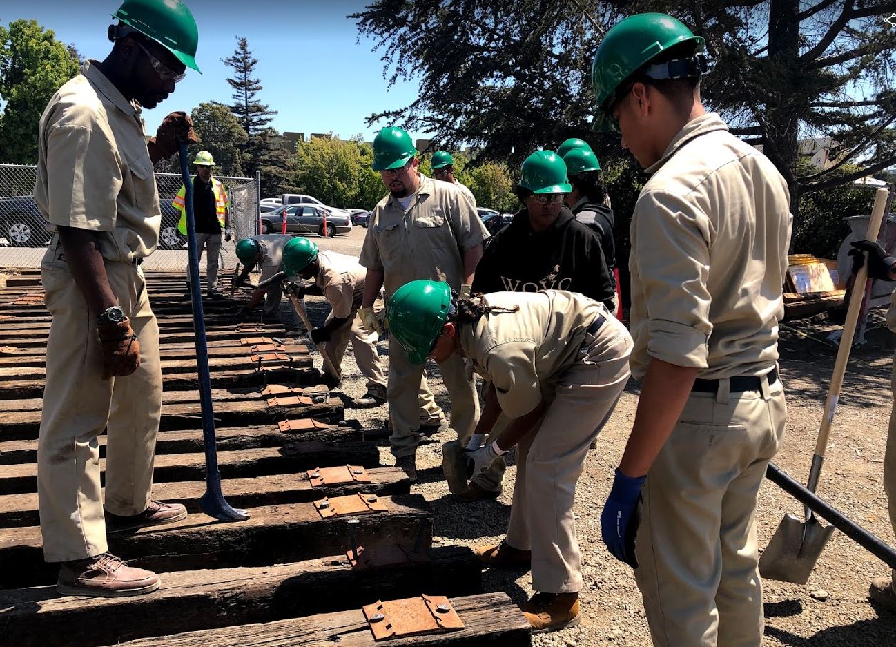 students working on track section