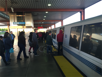 riders getting on a train