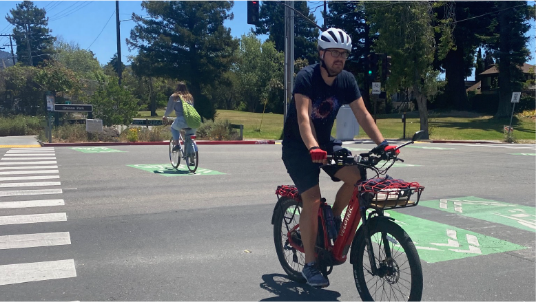 Safe Trips to BART picture of bicyclist near station