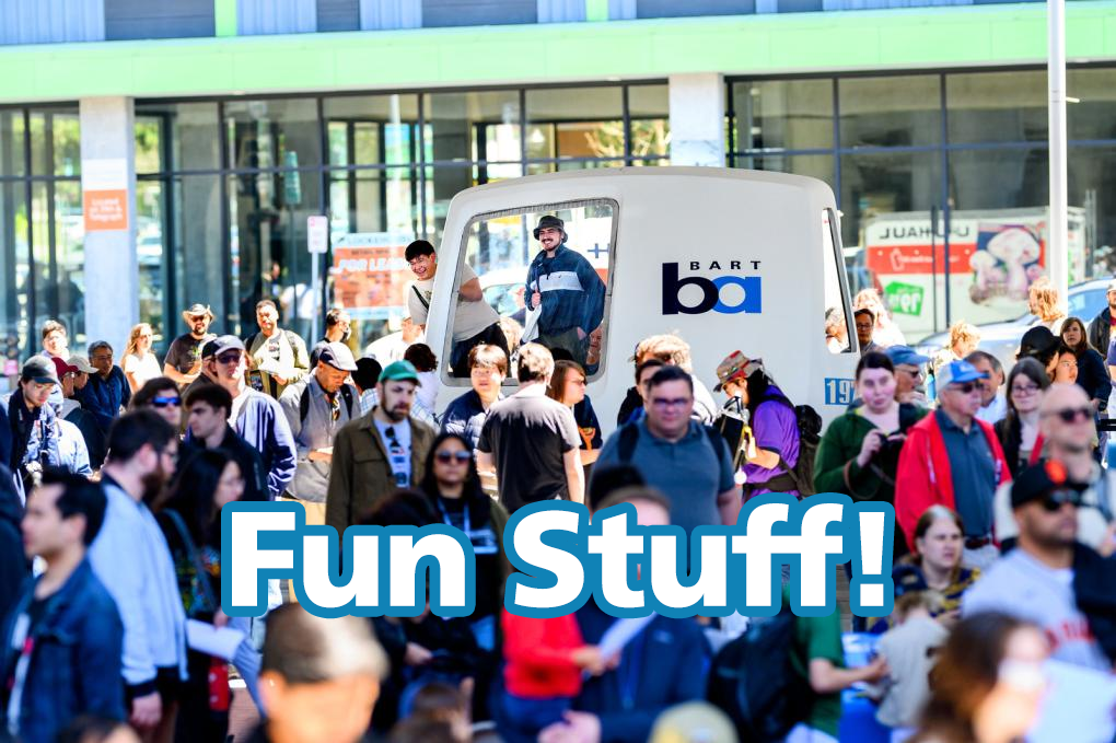 A photo of a big crowd in front of a BART train cab nose with the text "Fun Stuff!" written on the image