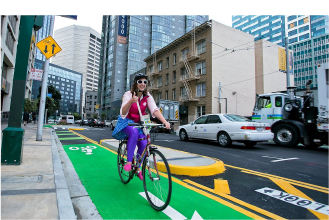 Safe Trips to BART project launch picture of bicyclist in bike lane