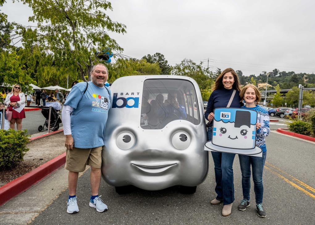 From left to right: BART board members Mark Foley, Melissa Hernandez, and Rebecca Saltzman are pictured at the BARTmobile's 20th Birthday Party at Orinda Station. 