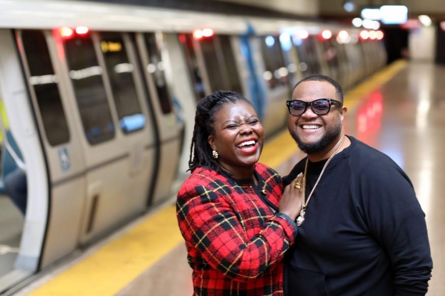 Crystal Matson and husband George smile on the BART platform